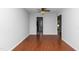 Open dining room with hardwood floors and a view of the kitchen at 6413 English Oaks Dr, Raleigh, NC 27615