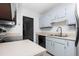 Cozy kitchen featuring modern faucet, stainless sink and updated appliances at 6413 English Oaks Dr, Raleigh, NC 27615