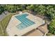 Aerial view of the community pool with ample seating and a pool at 6413 English Oaks Dr, Raleigh, NC 27615