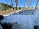 Small backyard with a light dusting of snow at 2103 Lambert Rd # 62, Cary, NC 27519