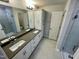 Bathroom boasts double sinks, a shower, and ample storage at 2103 Lambert Rd # 62, Cary, NC 27519