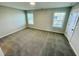 Bright bedroom featuring carpet and neutral walls at 2103 Lambert Rd # 62, Cary, NC 27519