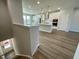 Open concept kitchen with modern appliances and hardwood floors at 2103 Lambert Rd # 62, Cary, NC 27519