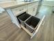 Convenient kitchen island with built-in double trash and recycling bins at 2103 Lambert Rd # 62, Cary, NC 27519