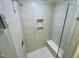 Shower stall with built-in seat and glass enclosure at 2103 Lambert Rd # 62, Cary, NC 27519