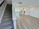 Modern staircase with grey carpet leading to the second floor at 2103 Lambert Rd # 62, Cary, NC 27519