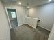 Upstairs hallway with carpet and access to bedrooms at 2103 Lambert Rd # 62, Cary, NC 27519