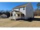 Two story light grey house with white accents at 235 Grand Griffon Way, Lillington, NC 27546