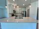 Kitchen with an island, stainless steel appliances, and pendant lighting at 235 Grand Griffon Way, Lillington, NC 27546