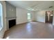 Living room featuring a fireplace, hardwood flooring and lots of natural light at 235 Grand Griffon Way, Lillington, NC 27546