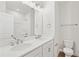 Bathroom featuring double sinks, a toilet, a large mirror and a shower at 1170 Holding Village Way, Wake Forest, NC 27587