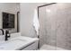 This bathroom is upgraded with a glass shower, decorative tile and modern finishes at 1170 Holding Village Way, Wake Forest, NC 27587
