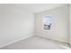 Bedroom with neutral carpet and a view of the neighborhood at 1170 Holding Village Way, Wake Forest, NC 27587