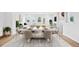 Dining area with a large table setting, bright natural light and open concept at 1170 Holding Village Way, Wake Forest, NC 27587