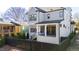 Two story home with backyard and black fence at 1610 Carson St, Raleigh, NC 27608