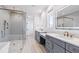 Luxurious bathroom with double vanity, large shower, and free-standing bathtub at 1610 Carson St, Raleigh, NC 27608