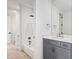 Contemporary bathroom with grey vanity, white subway tile, and a bathtub at 1610 Carson St, Raleigh, NC 27608