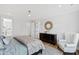 Bright bedroom with king bed and en-suite bathroom at 1610 Carson St, Raleigh, NC 27608