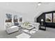 Spacious bonus room with large windows and comfortable seating area at 1610 Carson St, Raleigh, NC 27608