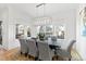 Bright dining room with dark wood table and gray chairs at 1610 Carson St, Raleigh, NC 27608