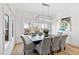 Elegant dining room features chandelier and large windows at 1610 Carson St, Raleigh, NC 27608