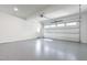 Attached garage with white automatic door and epoxy floor at 1610 Carson St, Raleigh, NC 27608