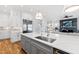 Modern kitchen with stainless steel appliances and white cabinetry at 1610 Carson St, Raleigh, NC 27608