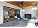 Outdoor patio with fireplace and access to the living room at 1610 Carson St, Raleigh, NC 27608
