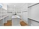 Spacious walk-in closet with ample shelving and hanging space at 1610 Carson St, Raleigh, NC 27608