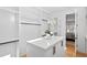 Large walk-in closet with custom shelving and a view into the bedroom at 1610 Carson St, Raleigh, NC 27608