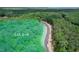 Aerial view of wooded lots 1-4, illustrating the serene setting and natural surroundings at 65 Firefly Overlook, Pittsboro, NC 27312