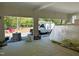Unfinished three car garage with white paint, windows, and work van at 65 Firefly Overlook, Pittsboro, NC 27312