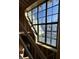 Large windows showcasing natural light in an under construction home at 65 Firefly Overlook, Pittsboro, NC 27312