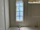 Room with large window and trim details showcases construction elements at 65 Firefly Overlook, Pittsboro, NC 27312