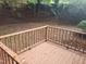 The backyard features a wooden deck overlooking a wooded area, providing a serene outdoor space at 1202 N Duke St, Durham, NC 27701