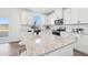 Kitchen island with granite countertop and ample seating at 126 Norman Ave, Lillington, NC 27546