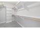 Spacious walk-in closet with shelves and double hanging rods at 3313 Mission Olive Pl, New Hill, NC 27562