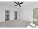 Light filled bedroom with en-suite bathroom and spacious closet space at 2337 E Main St, Durham, NC 27703