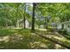Large backyard with trees, shed and play area at 3015 Old Raleigh Rd, Apex, NC 27502