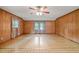 Bedroom with wood paneling and tiled floor at 3015 Old Raleigh Rd, Apex, NC 27502