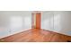 Simple bedroom with hardwood floors and closet at 3015 Old Raleigh Rd, Apex, NC 27502