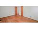 Simple bedroom with hardwood floors and two closets at 3015 Old Raleigh Rd, Apex, NC 27502