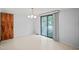 Bright dining area with a chandelier and sliding door at 3015 Old Raleigh Rd, Apex, NC 27502