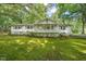 Front view of a white ranch house with a porch at 3015 Old Raleigh Rd, Apex, NC 27502