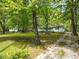Ranch house on a wooded lot with a long driveway at 3015 Old Raleigh Rd, Apex, NC 27502