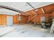 Garage interior with staircase to upper level and workshop area at 3015 Old Raleigh Rd, Apex, NC 27502