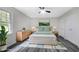 Spacious bedroom with ample closet space and wood-look floors at 116 Oak Ridge Dr, Willow Springs, NC 27592
