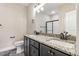 Bathroom with granite countertops, double sinks, and tile flooring at 258 Thistle Ct, Sanford, NC 27332