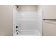 Bathroom area showcasing a shower and tub combination with matte black fixtures and clean lines at 258 Thistle Ct, Sanford, NC 27332