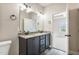 Bathroom with double sink granite countertop vanity at 258 Thistle Ct, Sanford, NC 27332